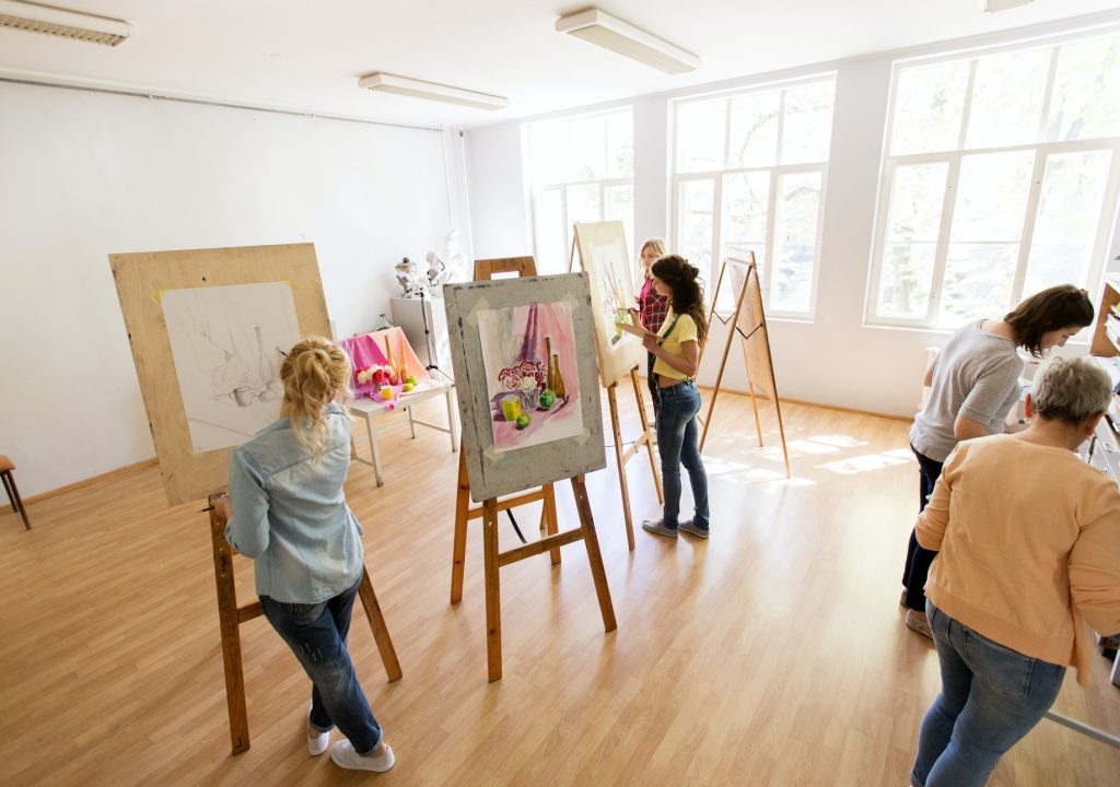 woman-artists-with-brushes-painting-at-art-school.jpg woman-artists-with-brushes-painting-at-art-school.jpg